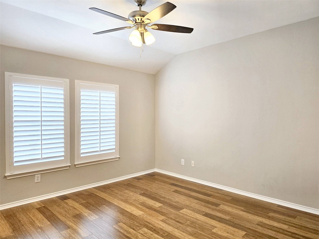 2211 Runnels Street Houston, TX 77003 - Photo 9 of 17 wooden floor in an empty room with a window