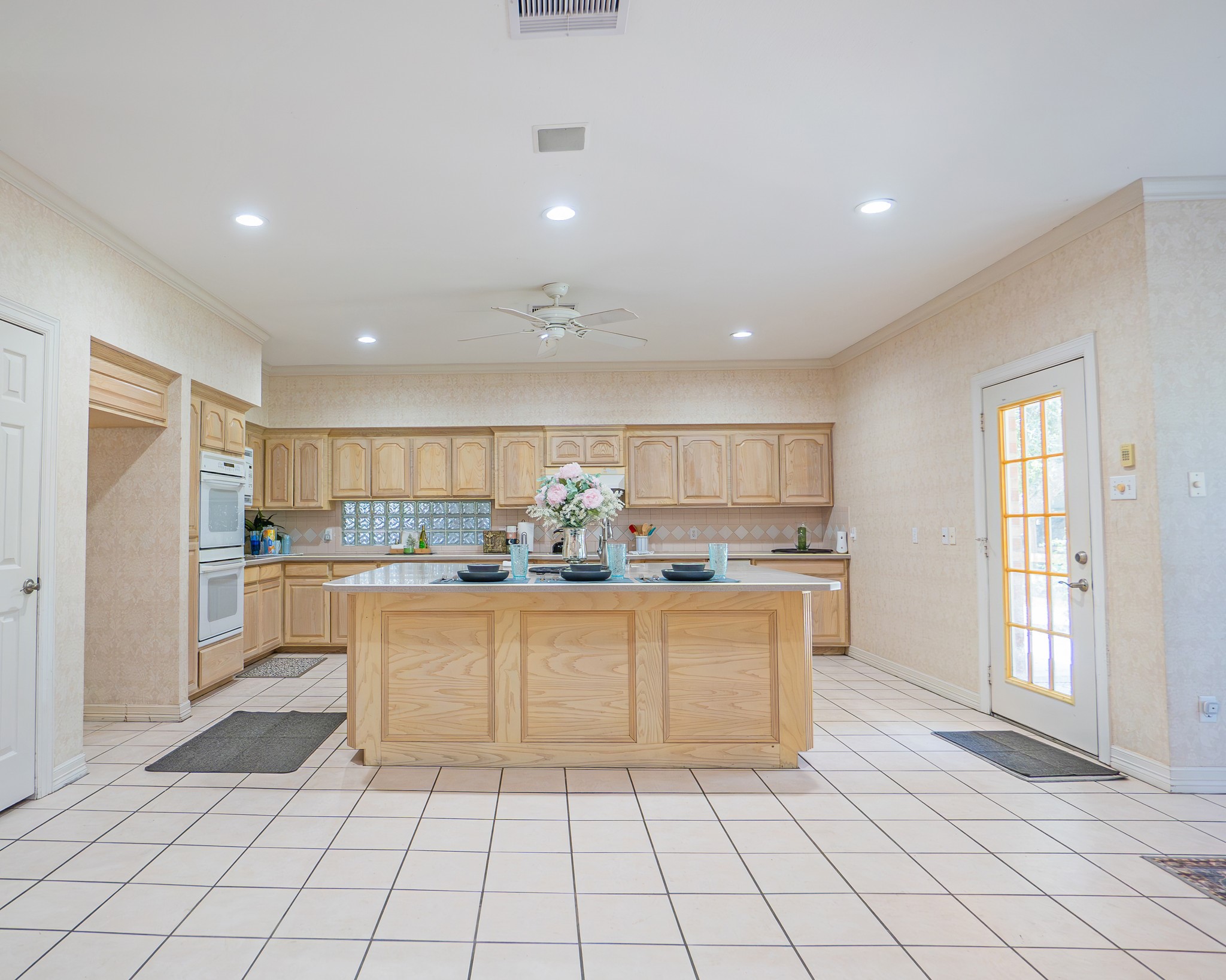 214 Williams Road Bay City, TX 77414 - Photo 28 of 48 a kitchen with stainless steel appliances granite countertop a refrigerator and a stove top oven