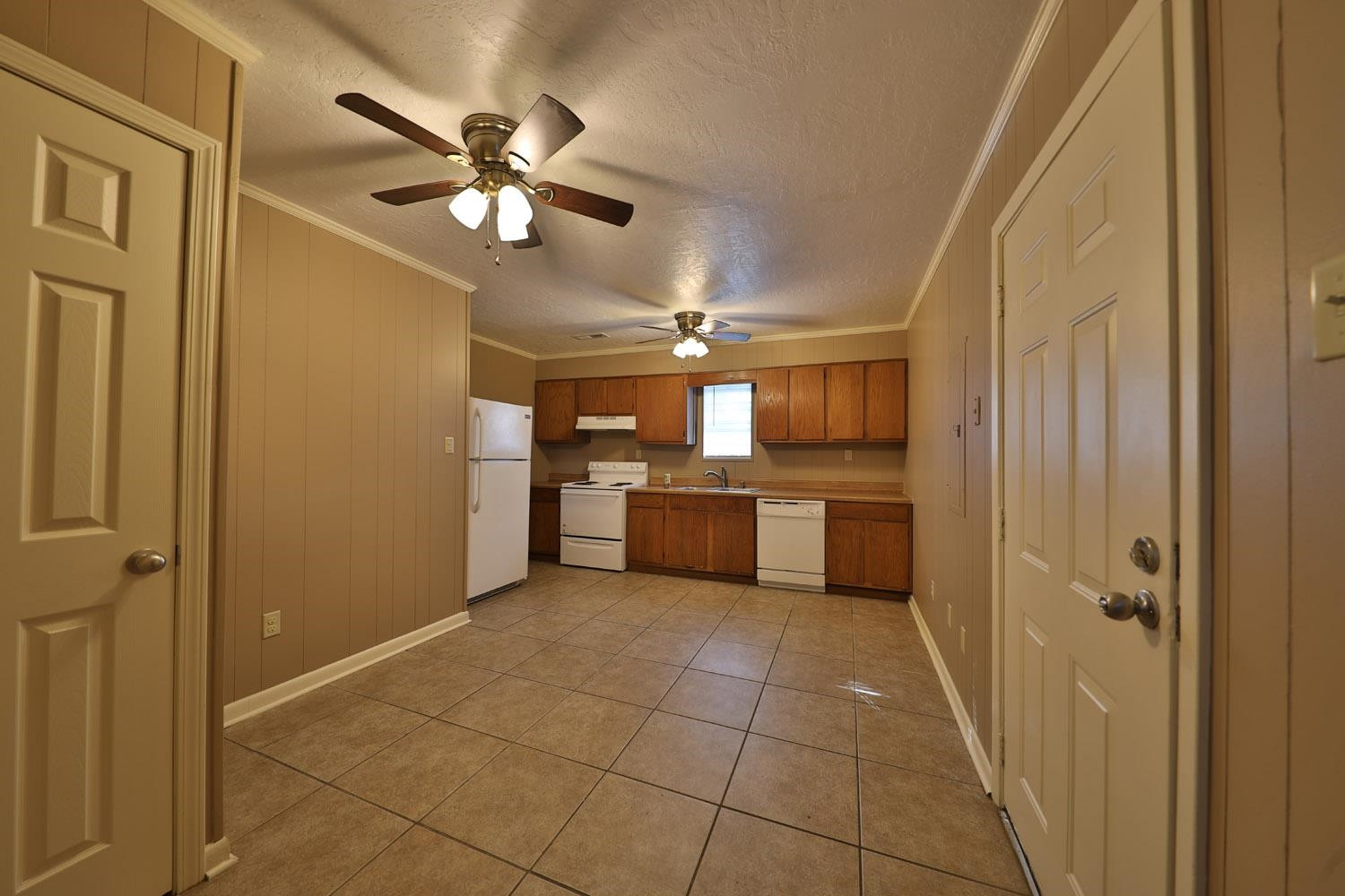 707 Baker Road Martin, TN 38237 - Photo 15 of 32 a view of a kitchen with a sink and cabinet area