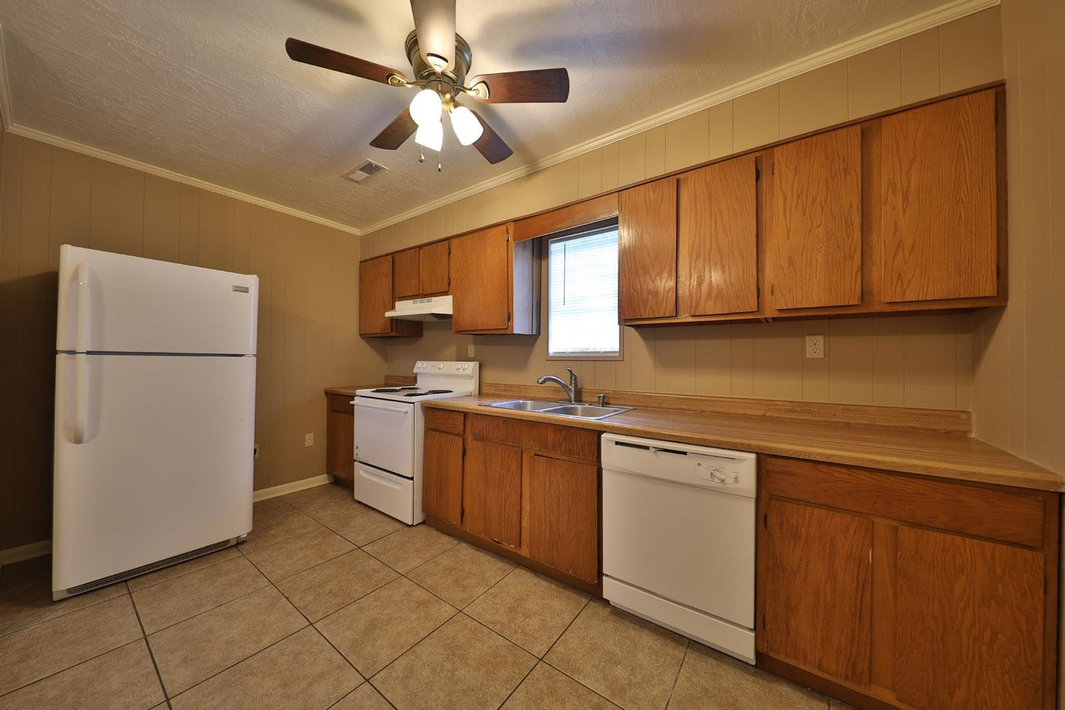 707 Baker Road Martin, TN 38237 - Photo 16 of 32 a kitchen with a refrigerator a sink and dishwasher