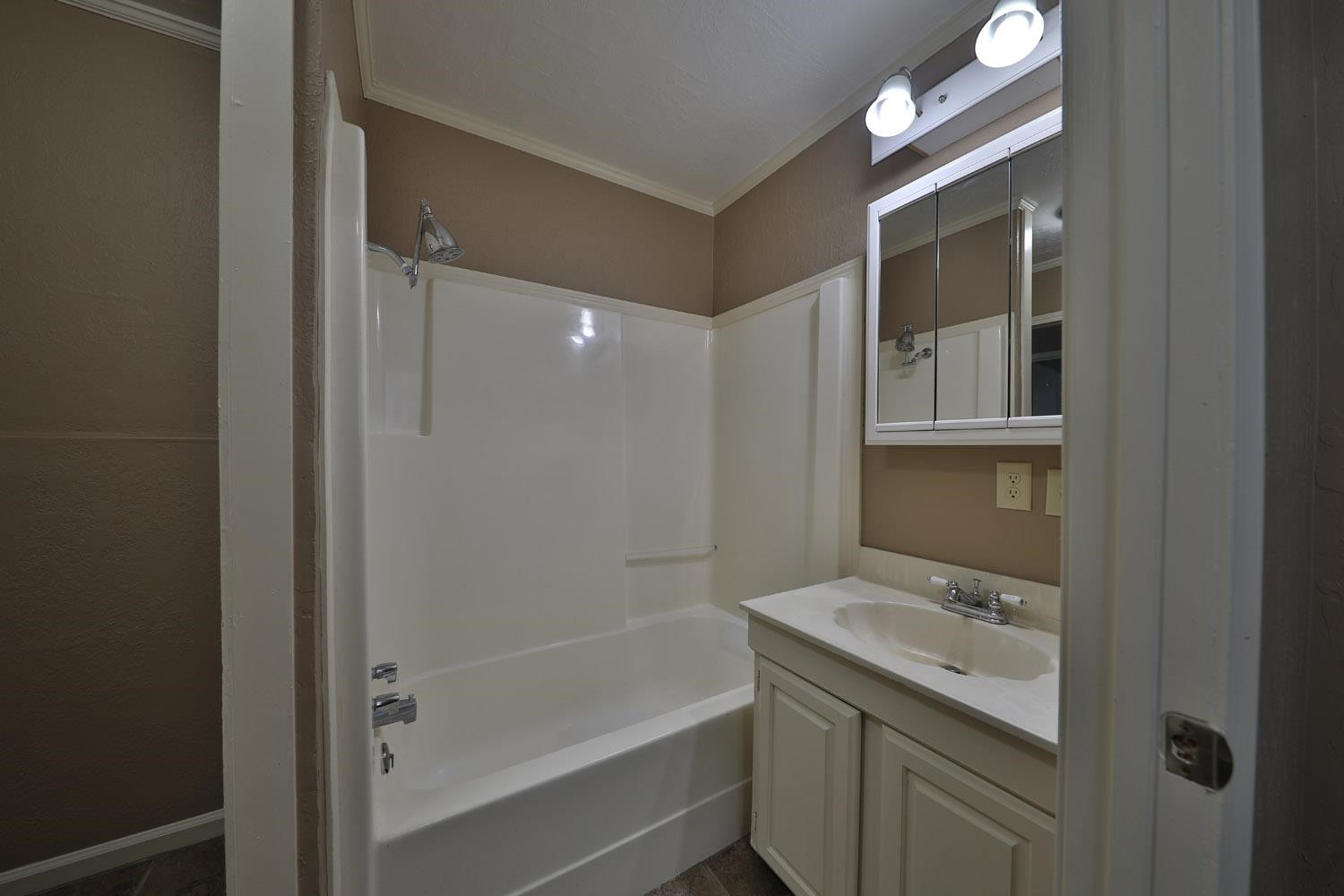 707 Baker Road Martin, TN 38237 - Photo 20 of 32 a bathroom with a sink a toilet and shower