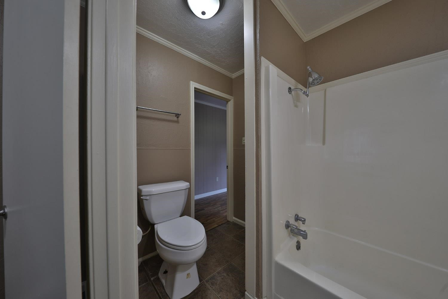 707 Baker Road Martin, TN 38237 - Photo 21 of 32 a bathroom with a toilet and a shower