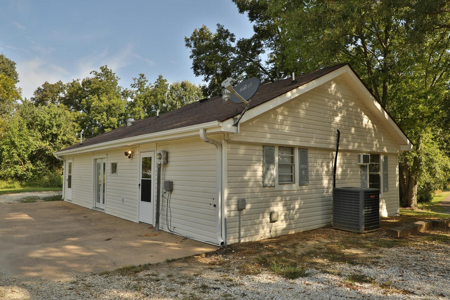707 Baker Road Martin, TN 38237 - Photo 8 of 32 a view of a house with a yard