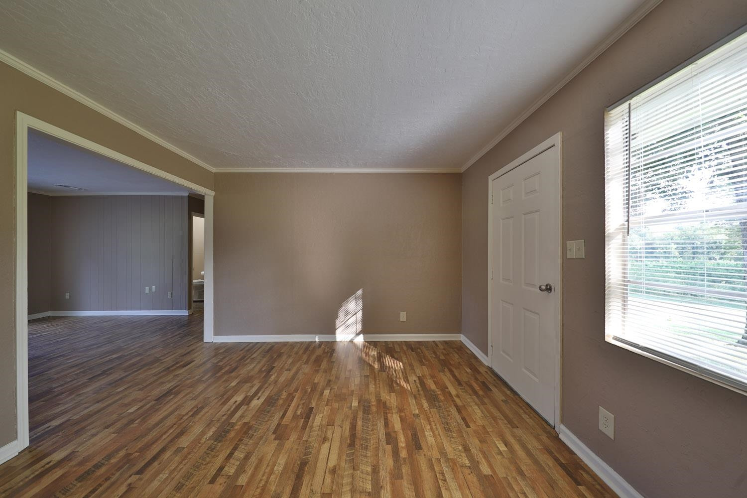 707 Baker Road Martin, TN 38237 - Photo 9 of 32 a view of wooden floor and brick walls