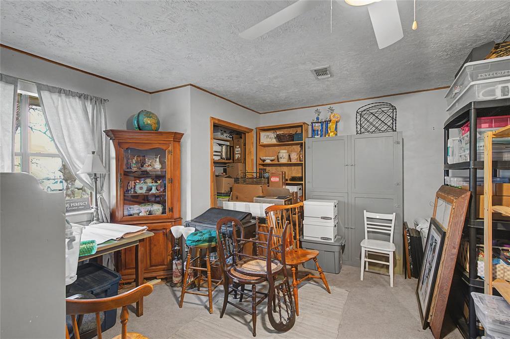 243 County Road 3851 Poolville, TX 76487 - Photo 25 of 34 a view of a livingroom with furniture and window