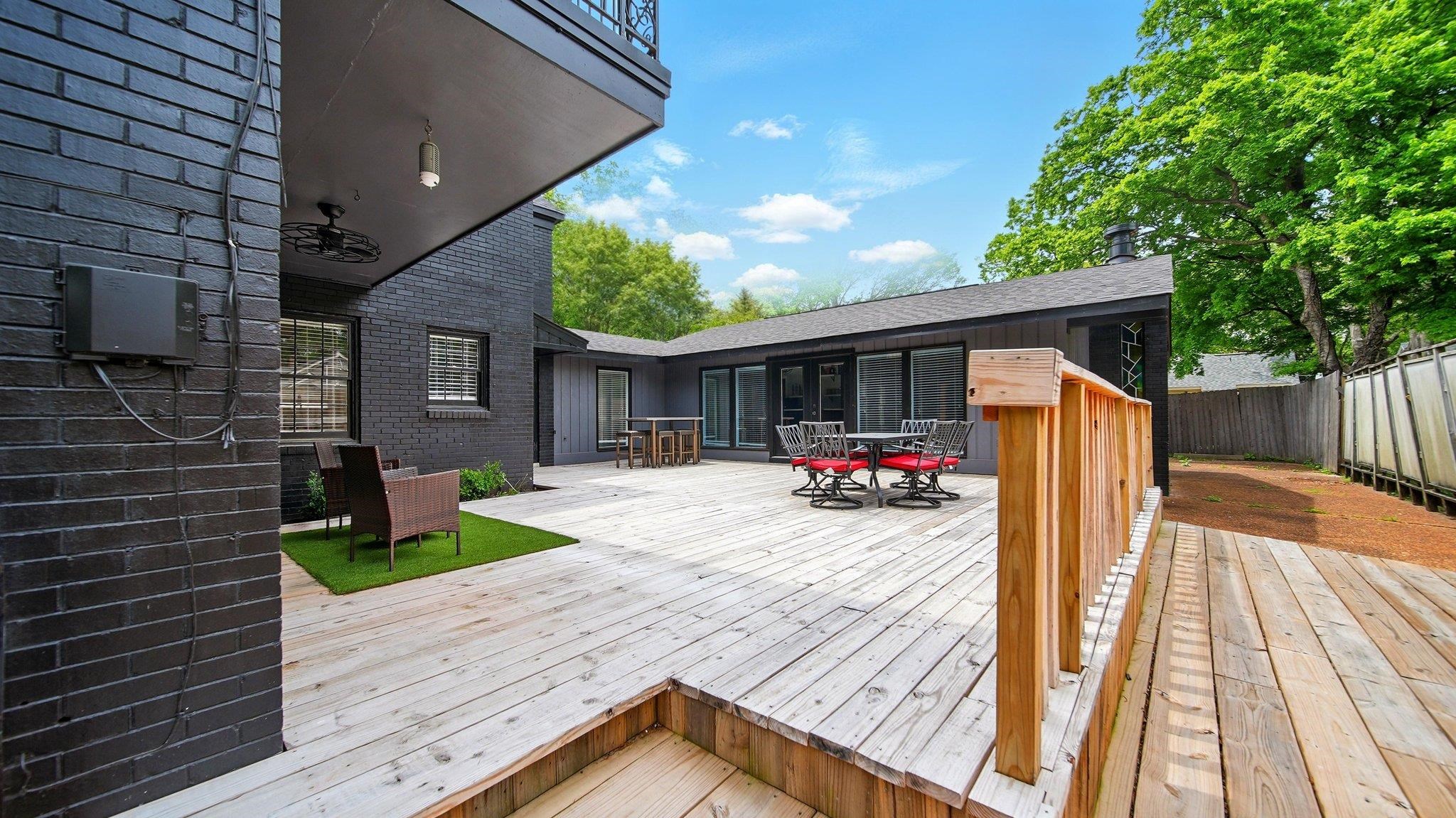 359 South Fenwick Road Memphis, TN 38111 - Photo 28 of 31 Wooden deck featuring outdoor dining area