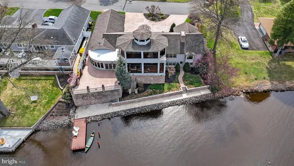 an aerial view of a house with swimming pool