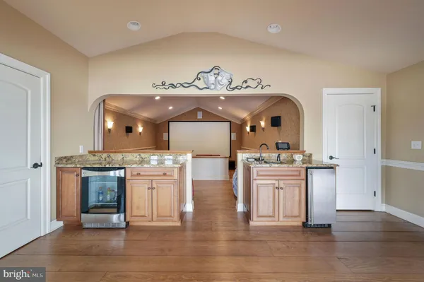 a bed room with a bed window and dresser