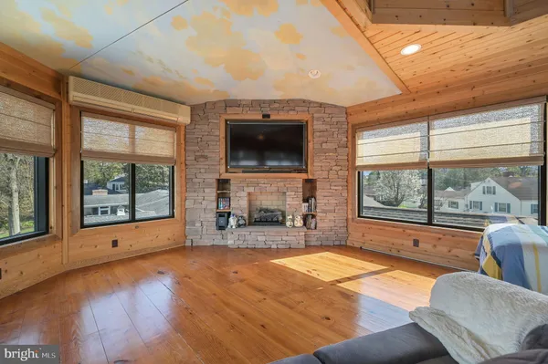 a living room with furniture and a table