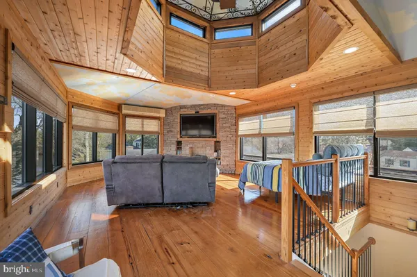 a room with furniture and gym equipment