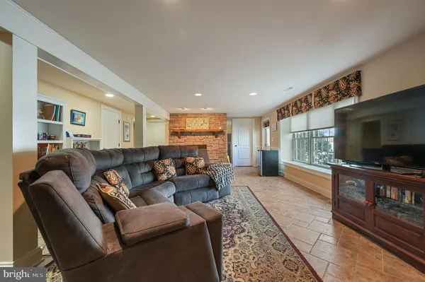 a bedroom with a bed and a view of bathroom