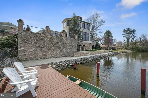 a view of a lake with a large building