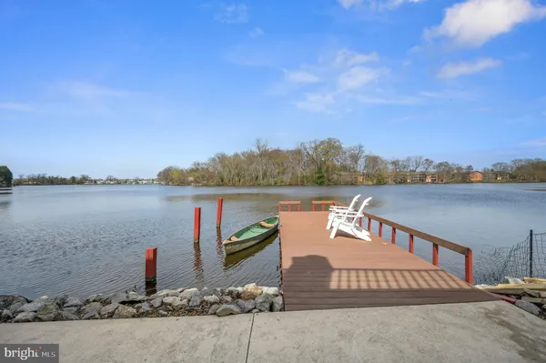 a aerial view of a house with a yard