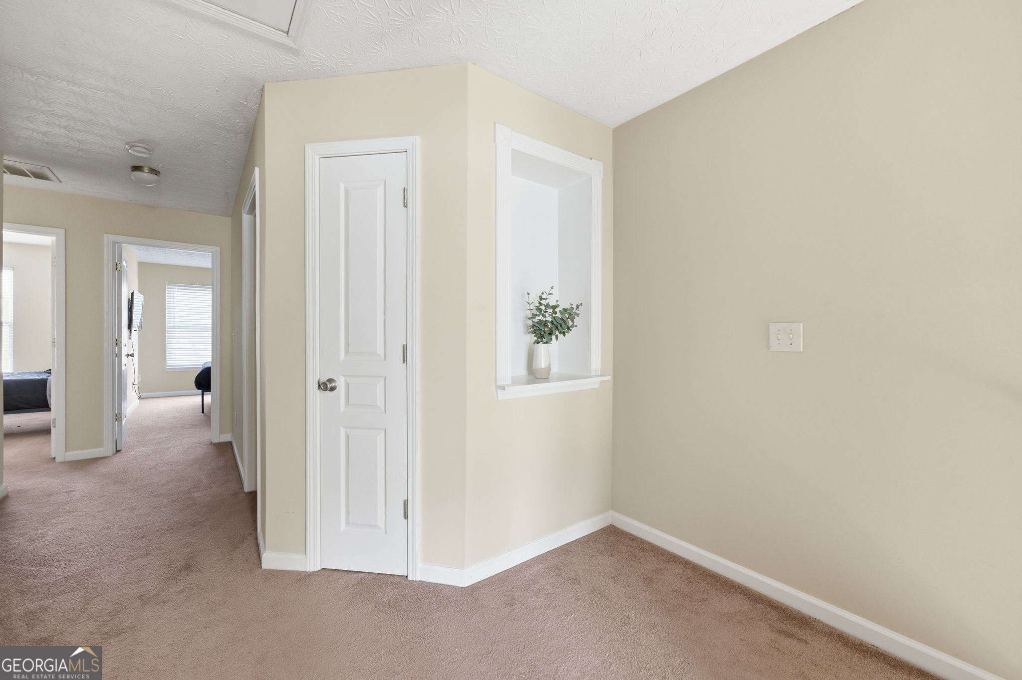 6022 Centennial Run Atlanta, GA 30349 - Photo 13 of 23 an empty room with windows
