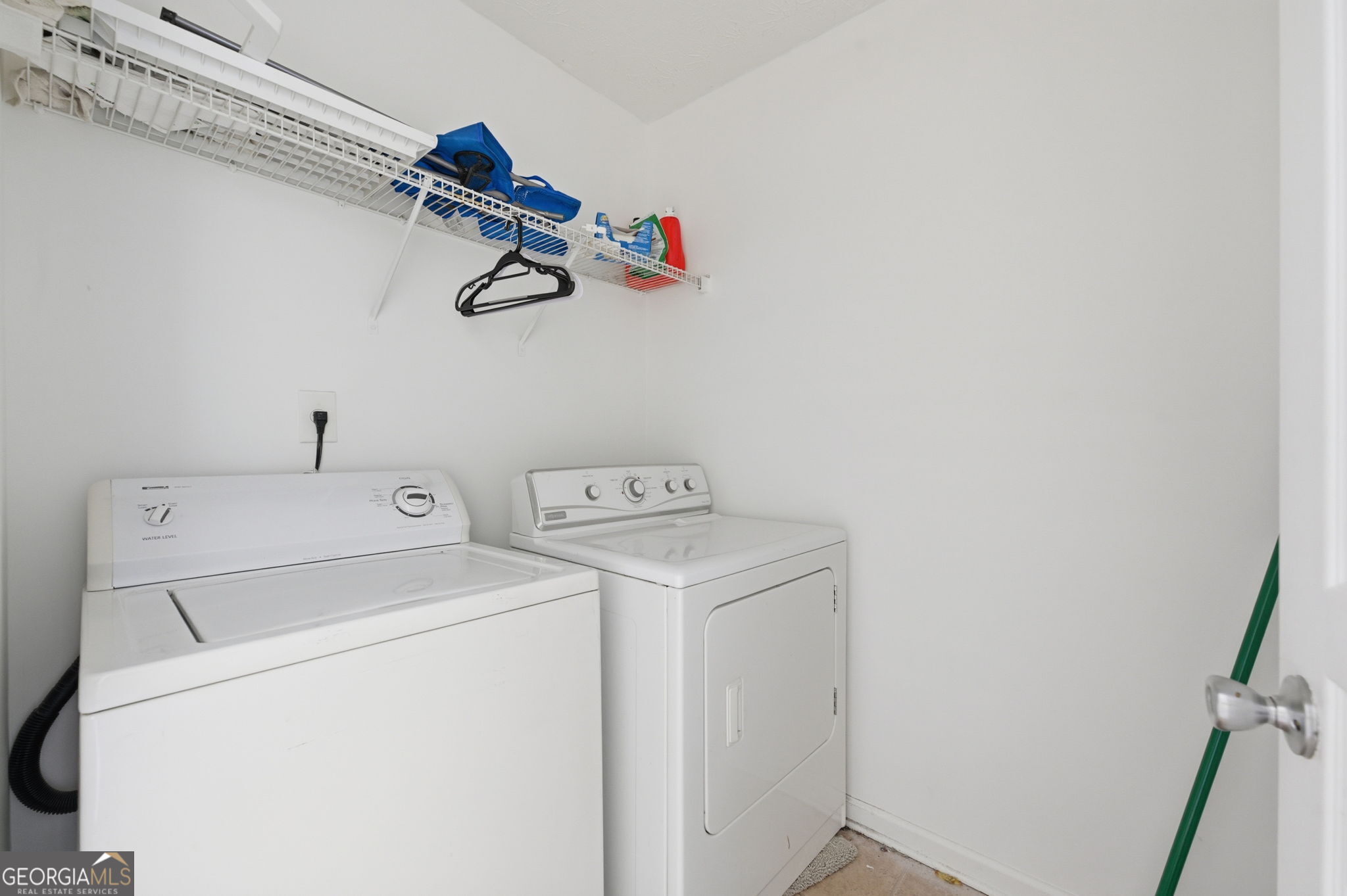 6022 Centennial Run Atlanta, GA 30349 - Photo 19 of 23 a utility room with dryer and washer