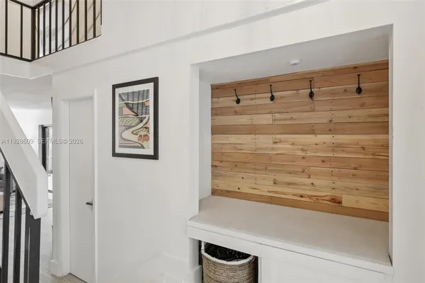 a bathroom with a bathtub and shower