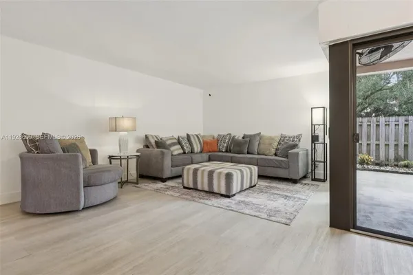 a living room with furniture and a couch