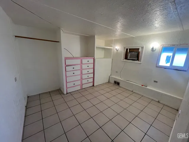 a view of a livingroom with natural light