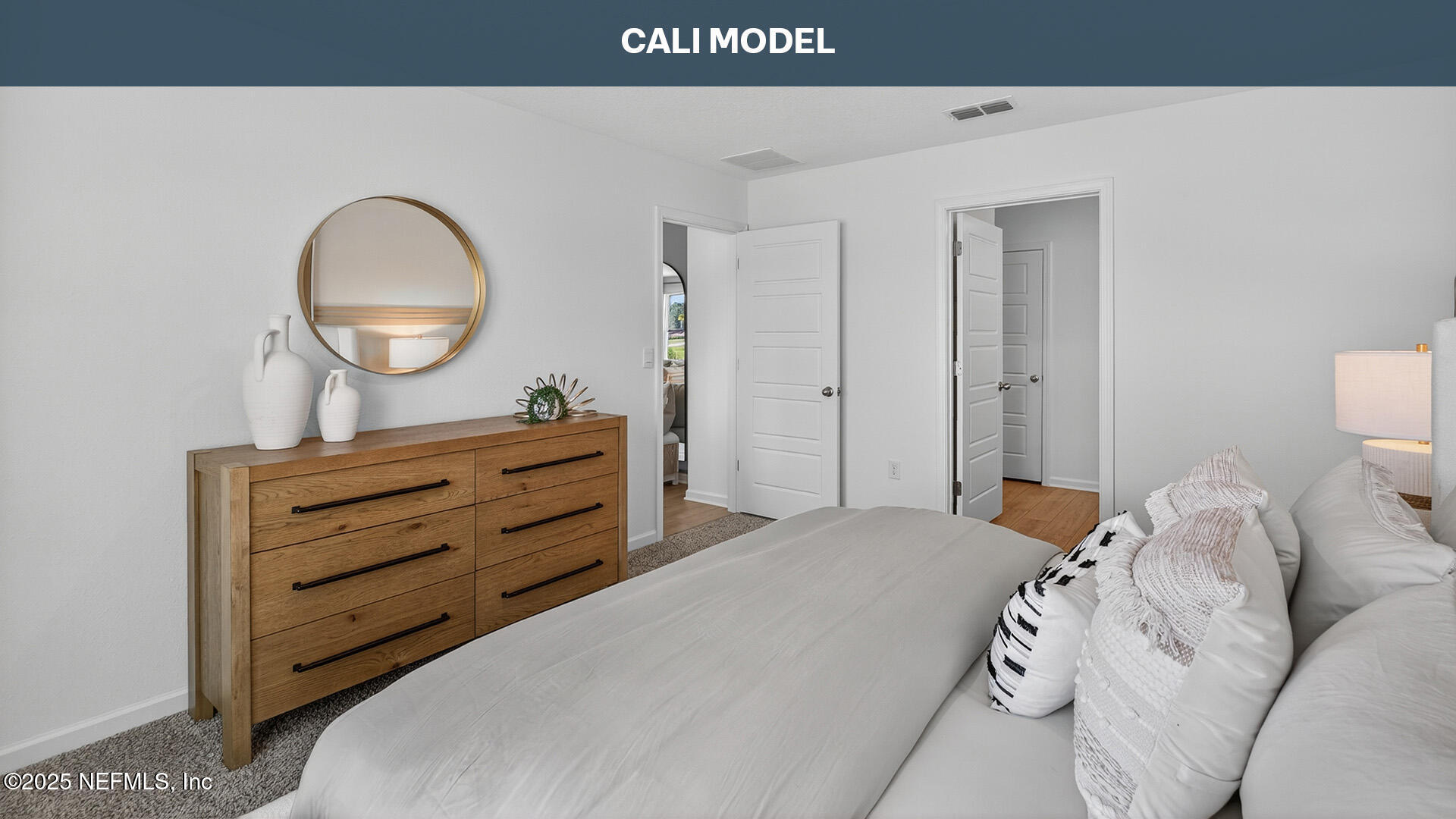 12397 Great Eagle Road Jacksonville, FL 32219 - Photo 15 of 63 a bedroom with a bed and a dresser