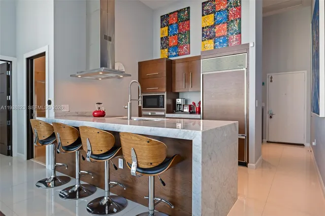 a bathroom with a toilet a sink and shower