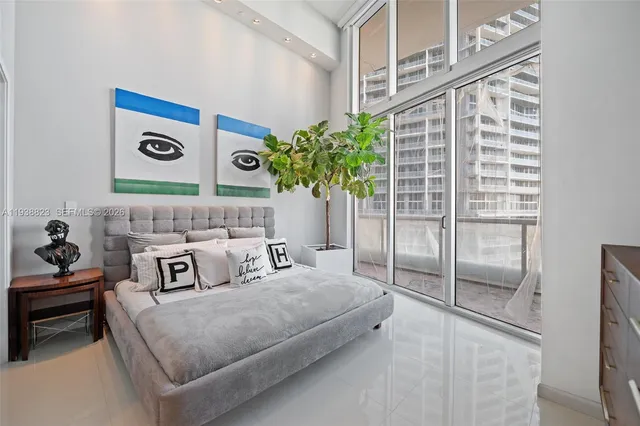 a bathroom with a toilet a sink and bathtub