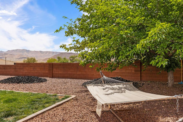 225 Falcon Court Ivins, UT 84738 - Photo 30 of 47 Fenced backyard with a mountain view