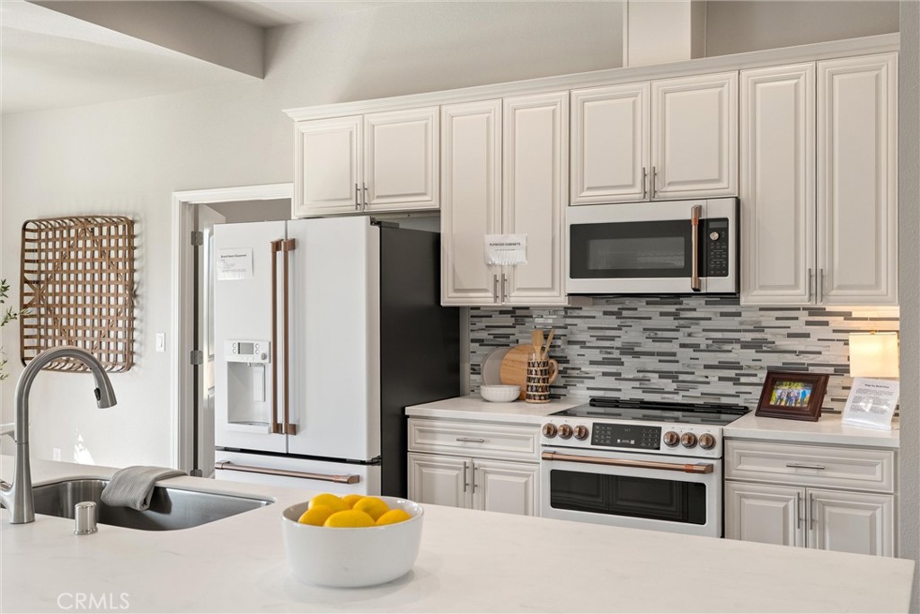 480 Valley View Drive Paradise, CA 95969 - Photo 11 of 48 a kitchen with stainless steel appliances a stove microwave and sink