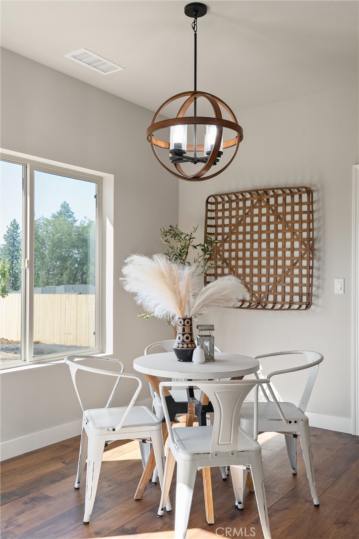 480 Valley View Drive Paradise, CA 95969 - Photo 16 of 48 a table and chairs in a room