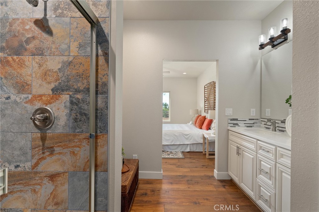 480 Valley View Drive Paradise, CA 95969 - Photo 25 of 48 a bathroom with a sink vanity and mirror