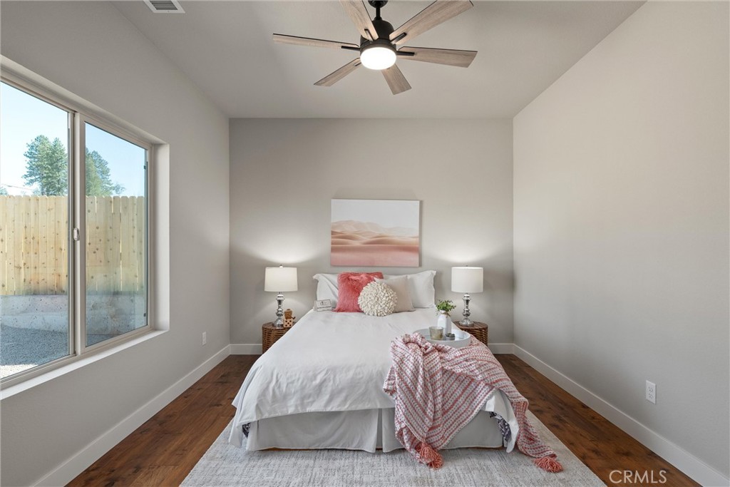 480 Valley View Drive Paradise, CA 95969 - Photo 30 of 48 a bedroom with a bed and window