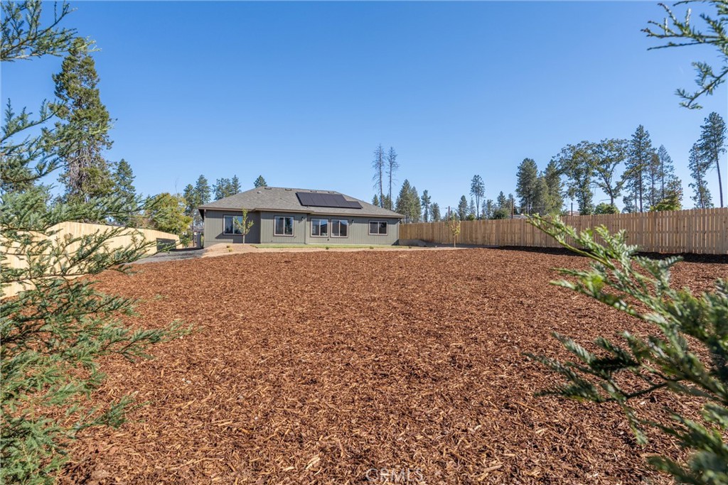 480 Valley View Drive Paradise, CA 95969 - Photo 38 of 48 a backyard of a house with table and chairs