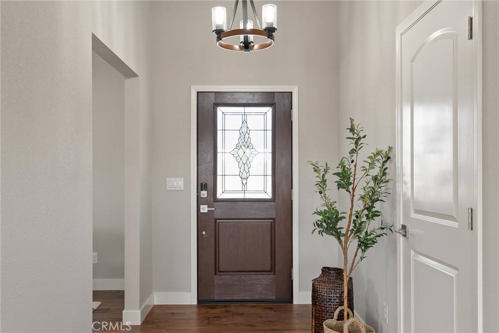 480 Valley View Drive Paradise, CA 95969 - Photo 5 of 48 a view of a hallway with potted plant and wooden floor