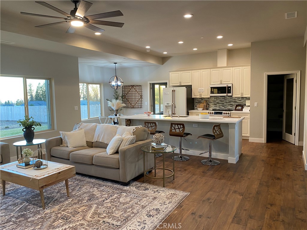 480 Valley View Drive Paradise, CA 95969 - Photo 7 of 48 a living room with furniture and kitchen view
