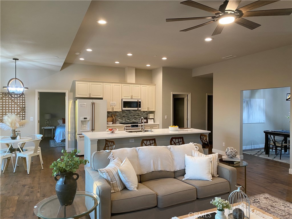 480 Valley View Drive Paradise, CA 95969 - Photo 9 of 48 a living room with stainless steel appliances kitchen island granite countertop furniture and a view of kitchen