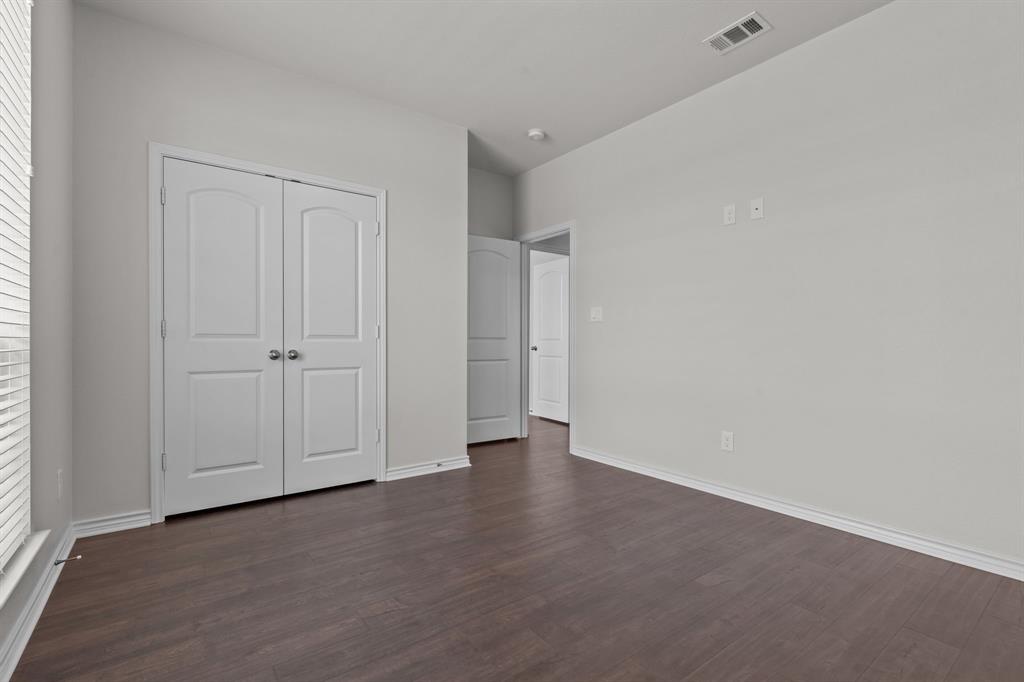 217 Angelina Court Azle, TX 76020 - Photo 18 of 34 a view of an empty room