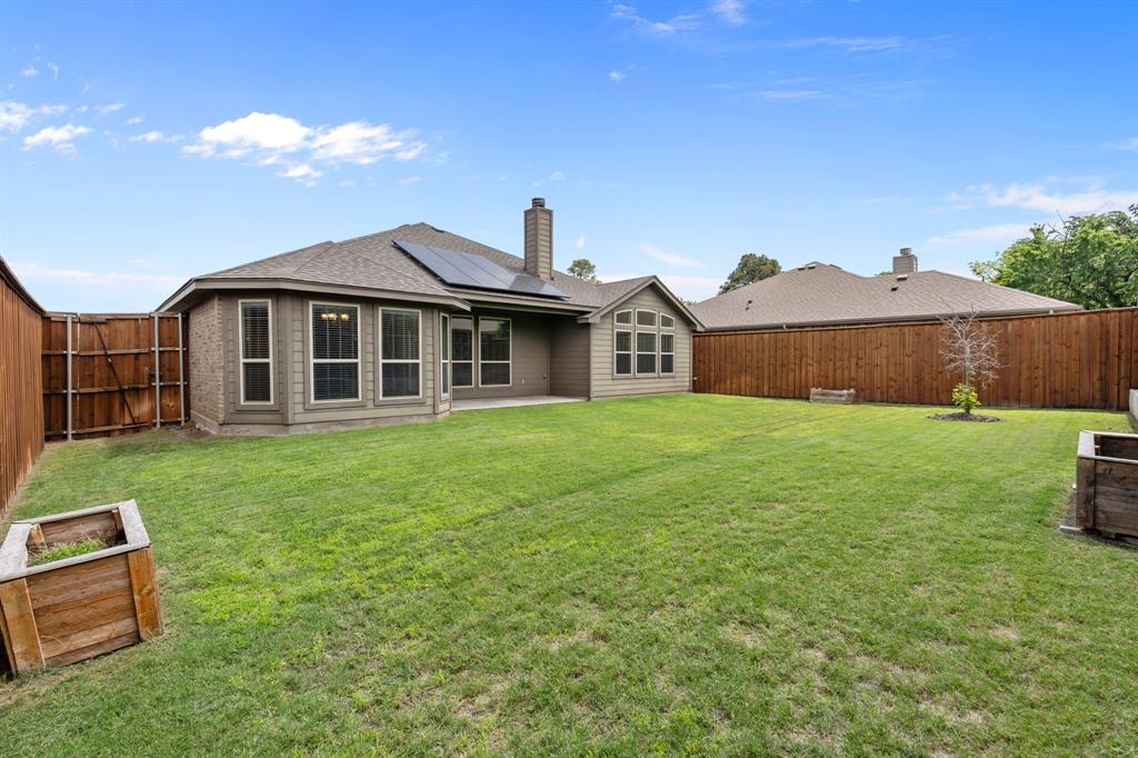 217 Angelina Court Azle, TX 76020 - Photo 30 of 34 a view of a house with a yard