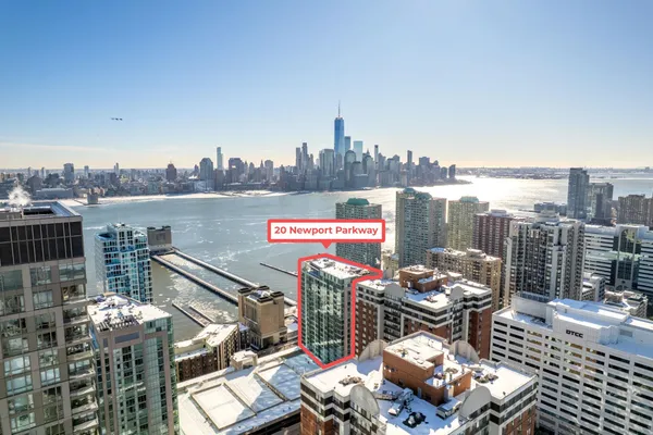 a terrace with outdoor seating and city view