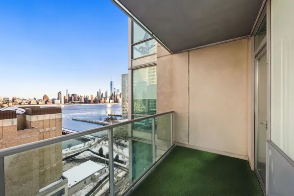 a view of a balcony with lake view