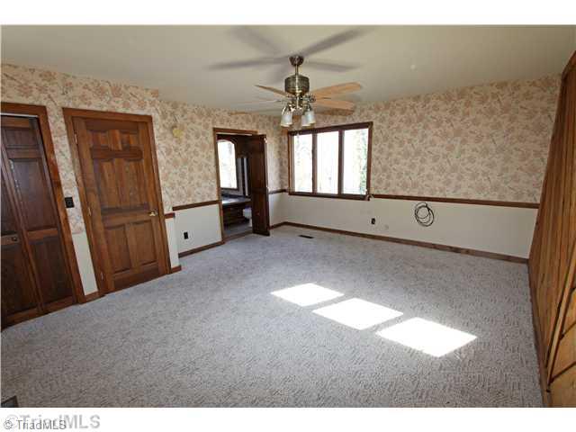 1180 Flinty Knoll Road Pinnacle, NC 27043 - Photo 4 of 9 Master Bedroom.