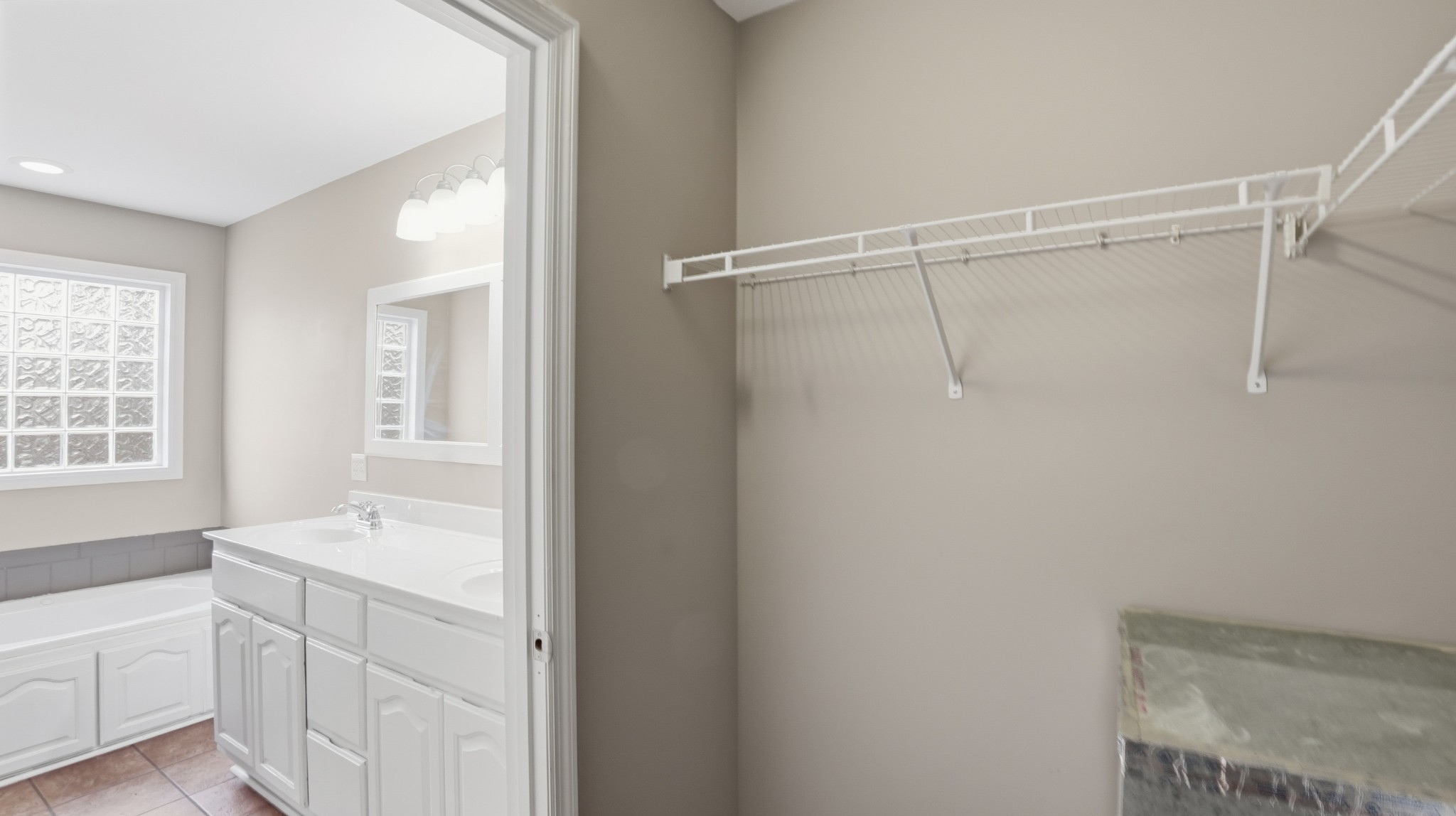 133 Riley Creek Road Tullahoma, TN 37388 - Photo 25 of 42 a bathroom with a sink a mirror and a bathtub