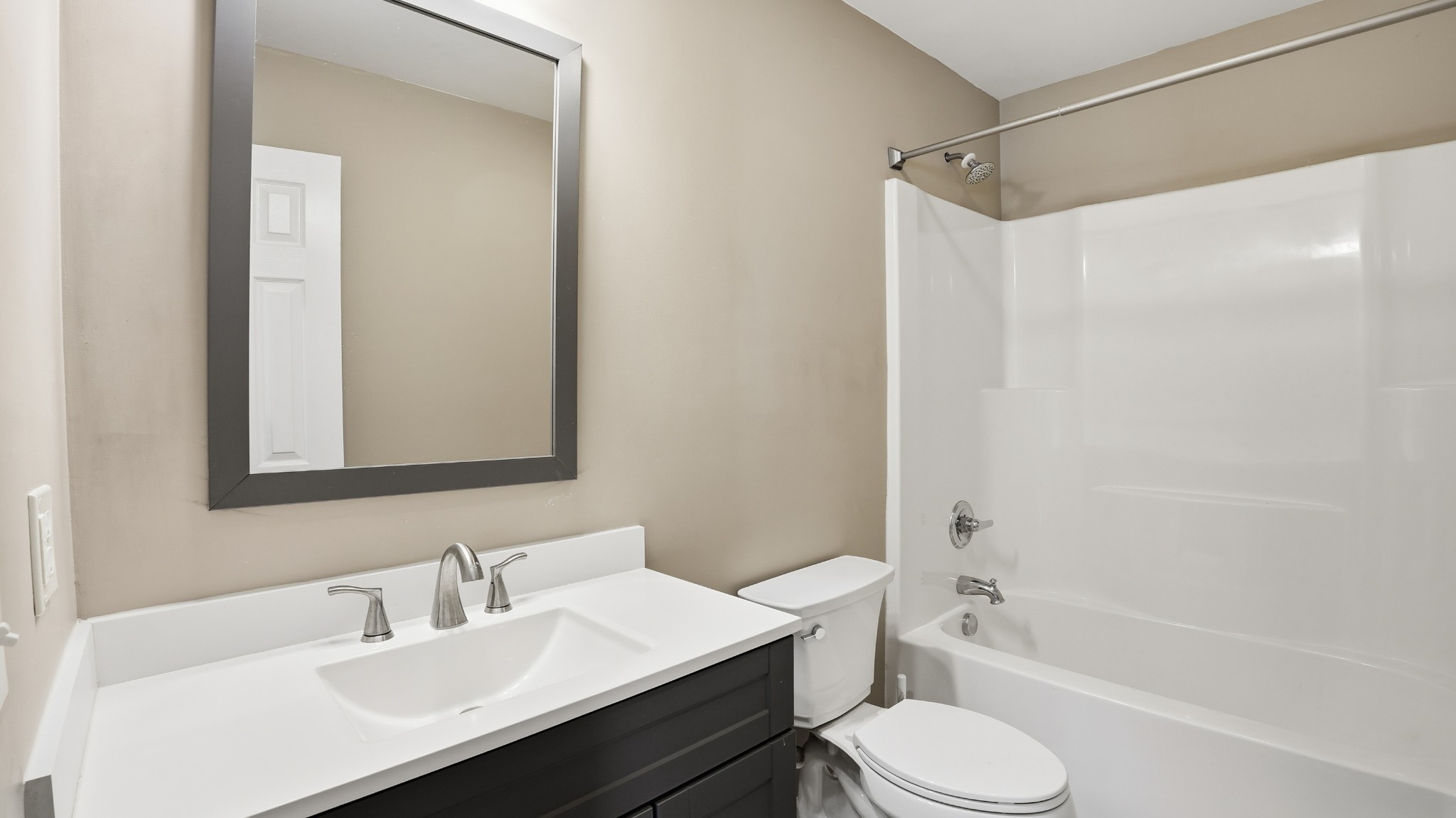 133 Riley Creek Road Tullahoma, TN 37388 - Photo 30 of 42 a bathroom with a sink toilet vanity and shower