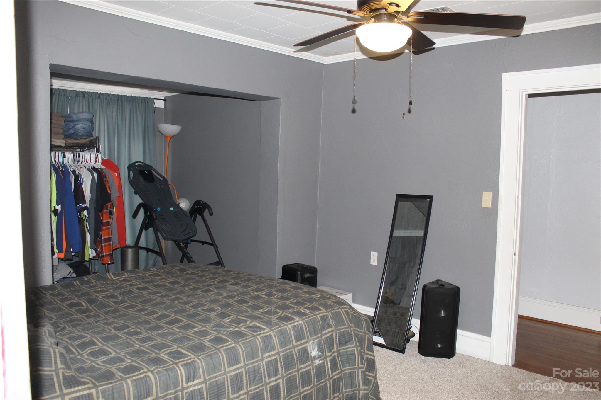 280 Bostic Yard Road Bostic, NC 28018 - Photo 11 of 34 a bedroom with a bed and a chandelier