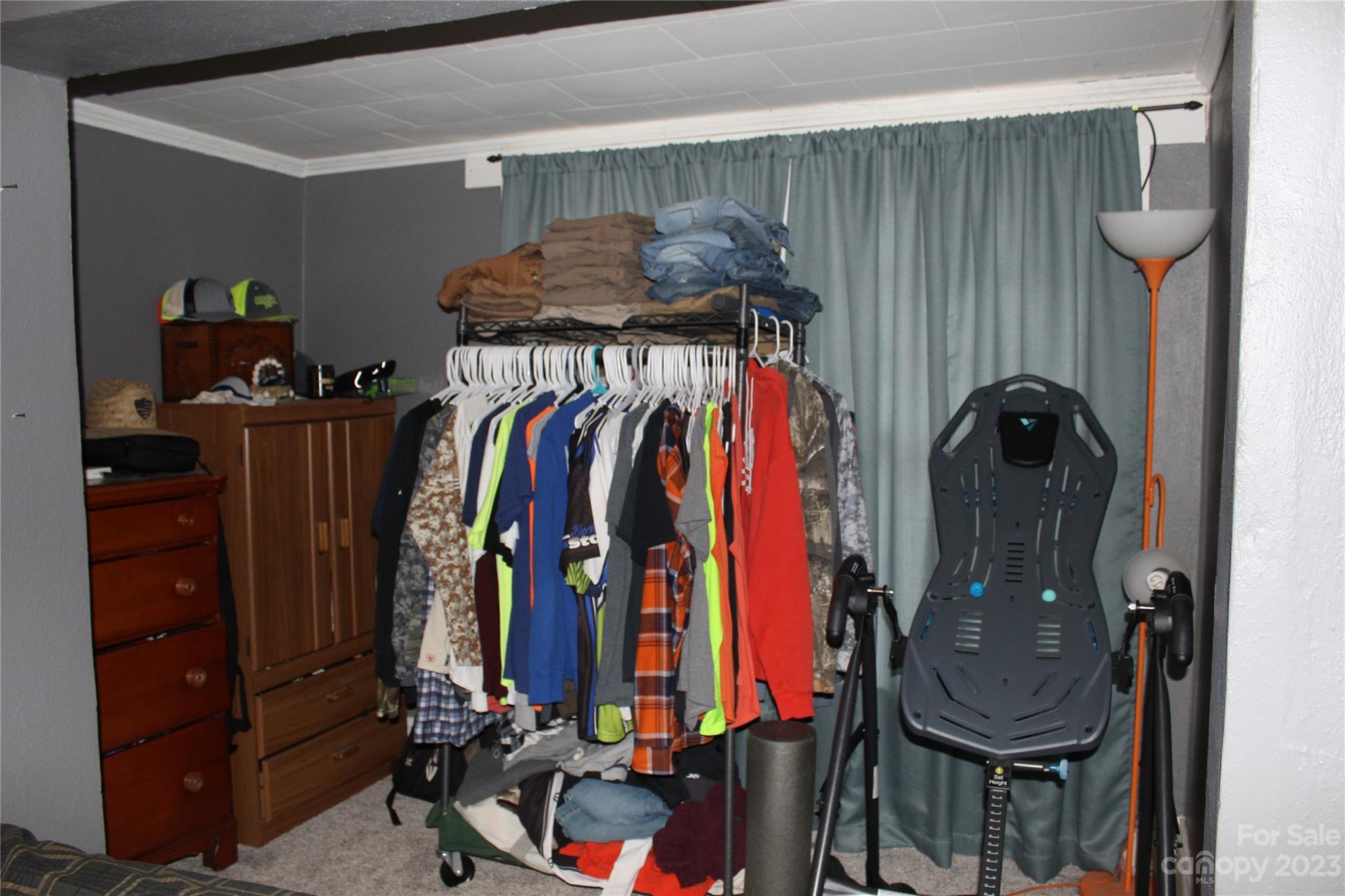 280 Bostic Yard Road Bostic, NC 28018 - Photo 12 of 34 a view of walk in closet with clothes and shoes