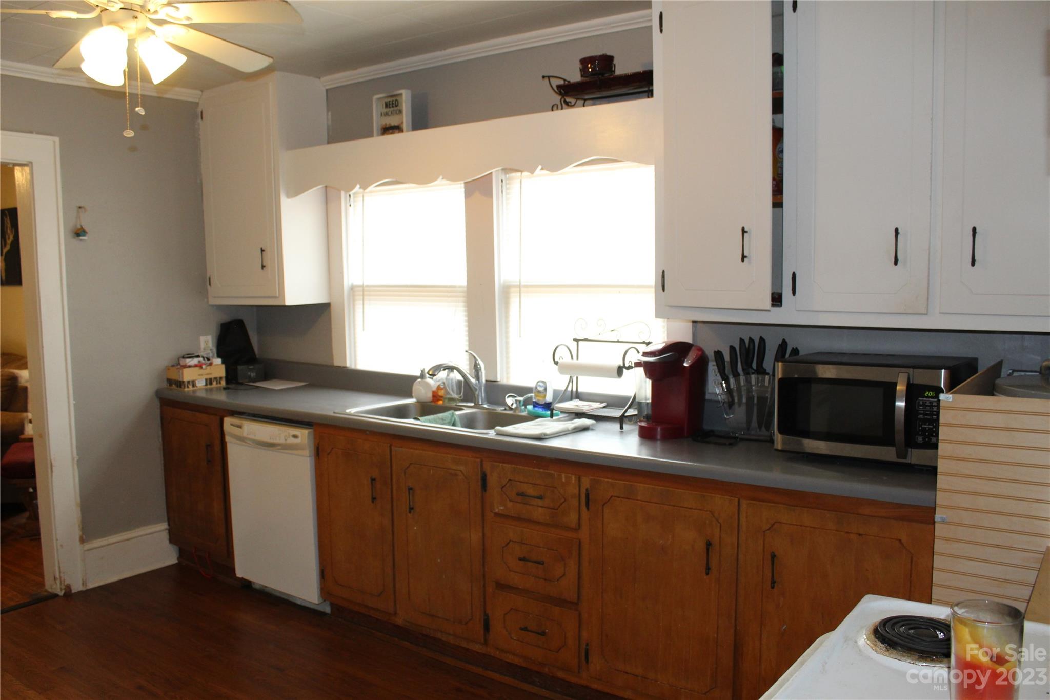 280 Bostic Yard Road Bostic, NC 28018 - Photo 15 of 34 a kitchen with stainless steel appliances granite countertop a sink a stove and a microwave