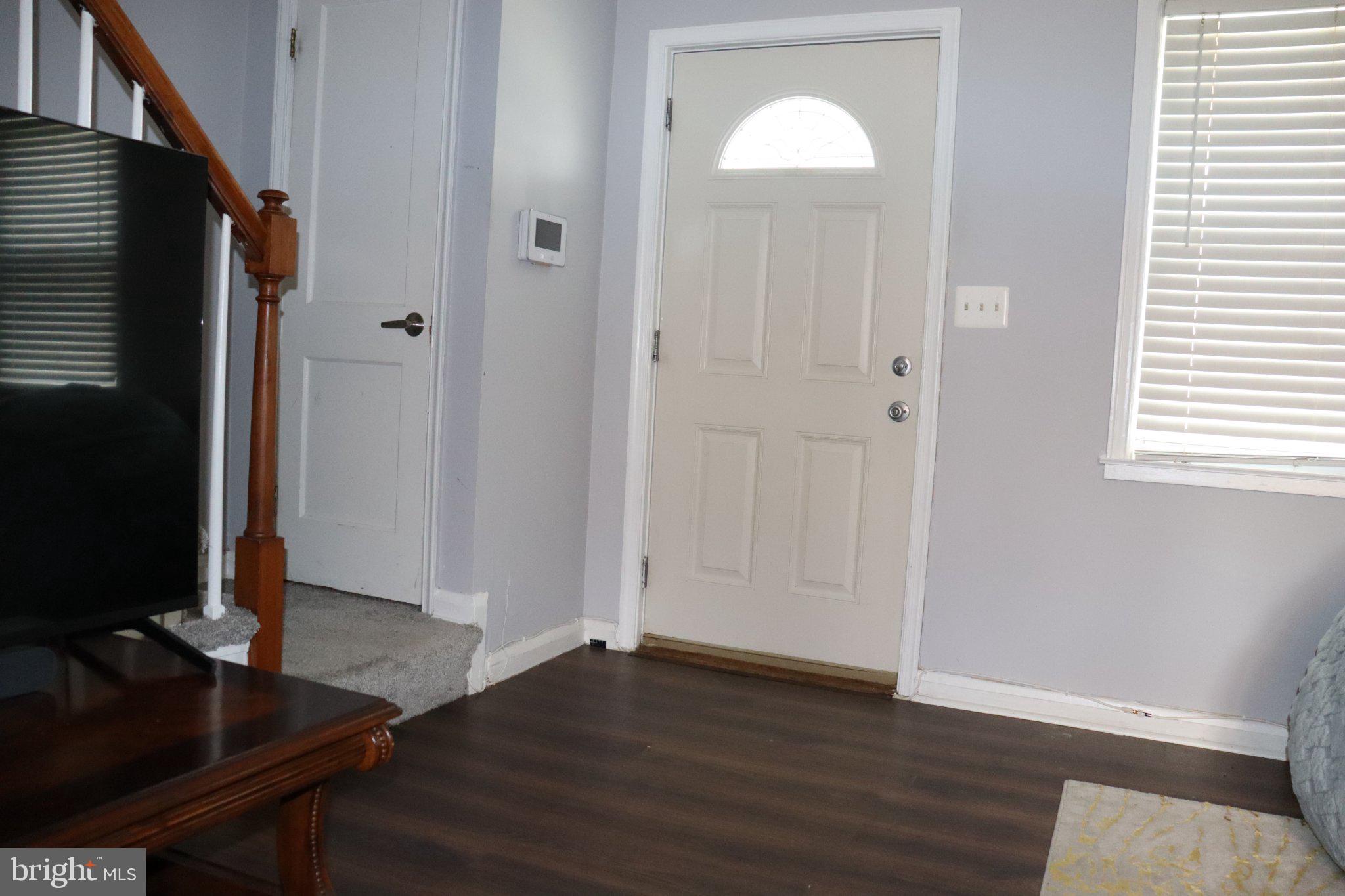 1328 Cedarcroft Road Baltimore, MD 21239 - Photo 25 of 39 Welcoming entryway with modern charm.