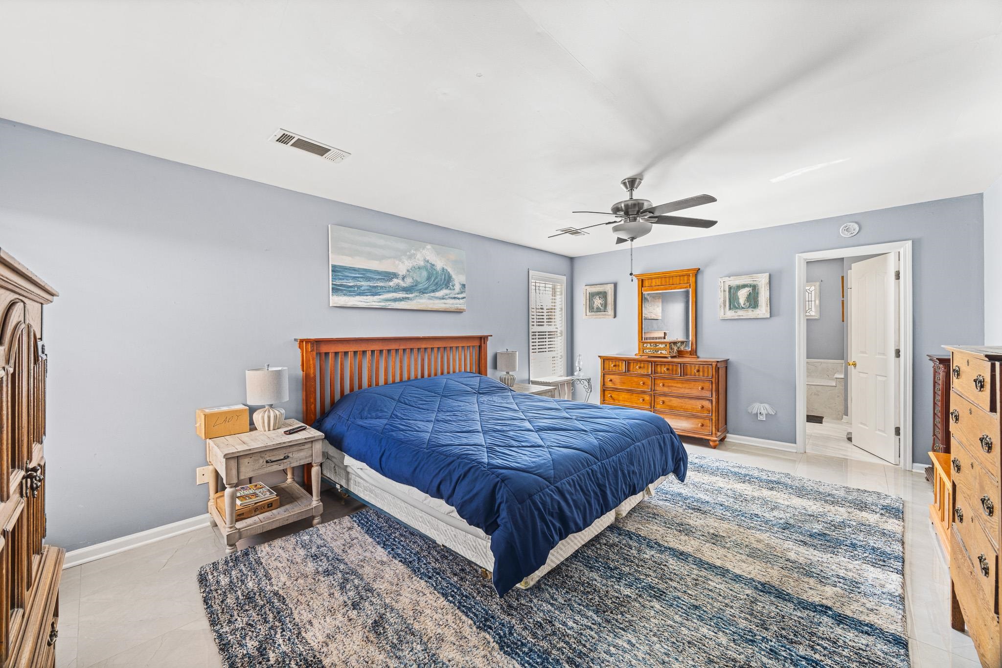 149 Abby Road Drummonds, TN 38023 - Photo 14 of 38 Bedroom featuring a ceiling fan and light tile patterned floors