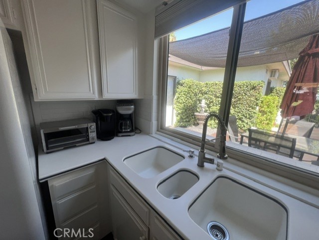36 El Toro Drive Rancho Mirage, CA 92270 - Photo 18 of 25 a kitchen with a sink and a window