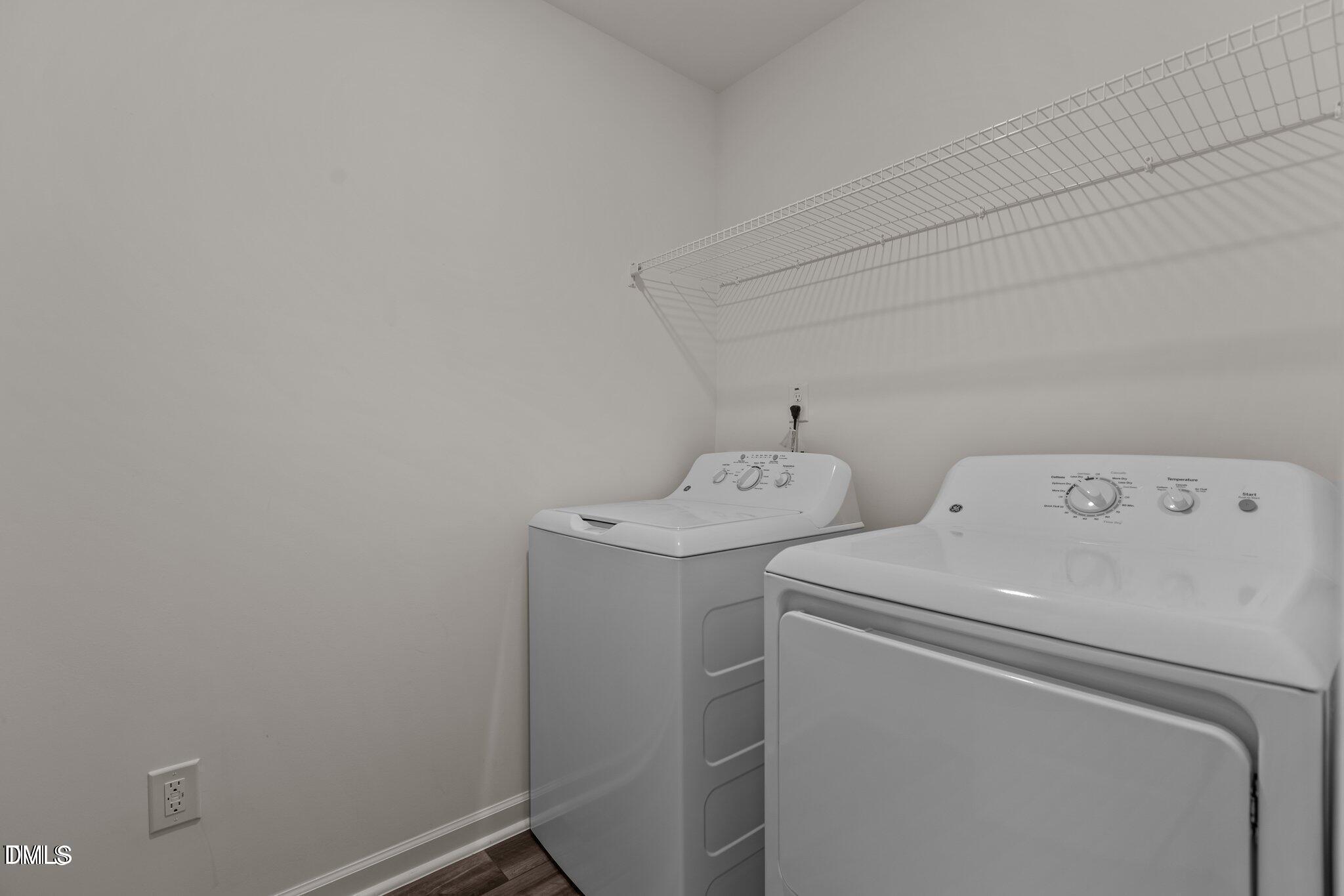 149 Bedstone Way Clayton, NC 27520 - Photo 22 of 22 a utility room with dryer and washer