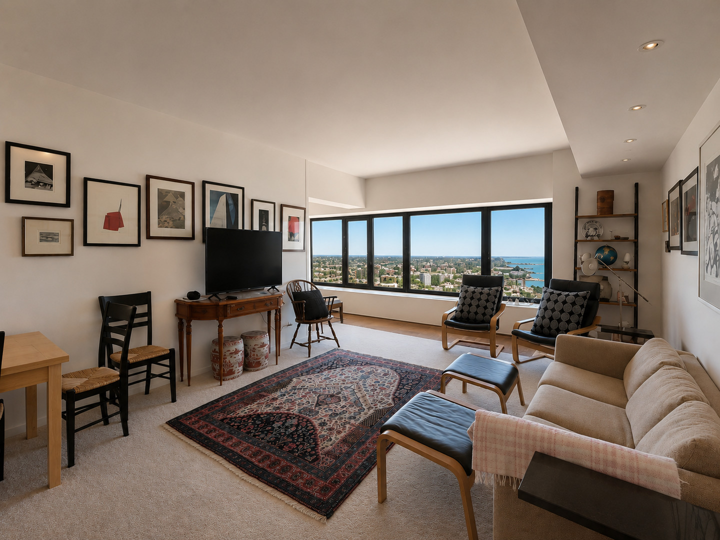 175 East Delaware Place, Unit 5403 Chicago, IL 60611 - Photo 7 of 20 a living room with furniture and a flat screen tv