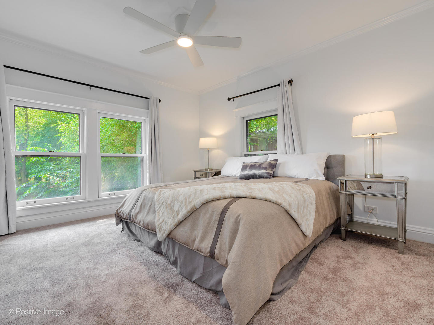 1137 Willow Road Winnetka, IL 60093 - Photo 18 of 31 a spacious bedroom with a bed and a window